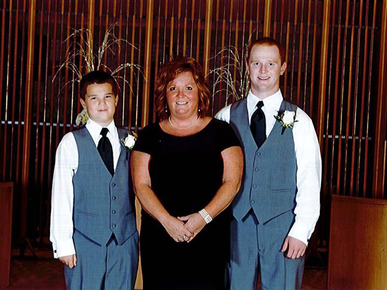 Belinda and her two children, Adam and Josh.