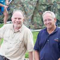 Longtime Missouri State Parks employees Denny Bopp and Jack Winburn pose for a photo together during a Capitol Campout event at Jefferson Landing State Historic Site.