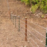 Fencing provided by Missouri State Parks creates a boundry between the trail and private property.