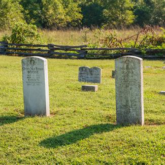 Photo of Olive and Nathan Boone’s tombstones in the family cemetery at Nathan Boone Homestead State Historic Site.